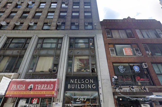 The victim rode the elevator with his tailor to the seventh floor of a building on W. 38 St. near Eighth Ave. about 1:15 p.m. Jan. 6, cops said. When they stepped off the elevator the victim was shot by a pair of crooks. (Google Maps)