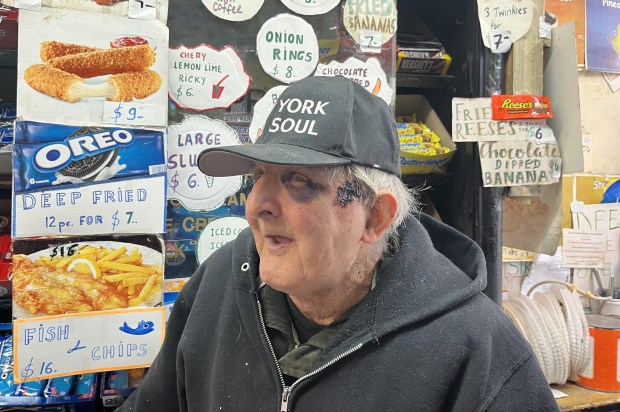 Ray Alvarez, a beloved Lower East Side store owner, shows his injuries after the attack. (Abby Wilson)