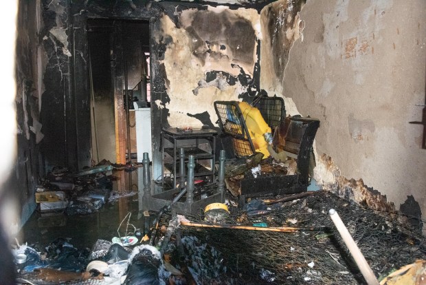 Fire damage is seen inside a first floor apartment at 178 Bond Street in the NYCHA Gowanus Houses in Brooklyn, New York City on Sunday, Feb. 4, 2024. (Gardiner Anderson for New York Daily News)
